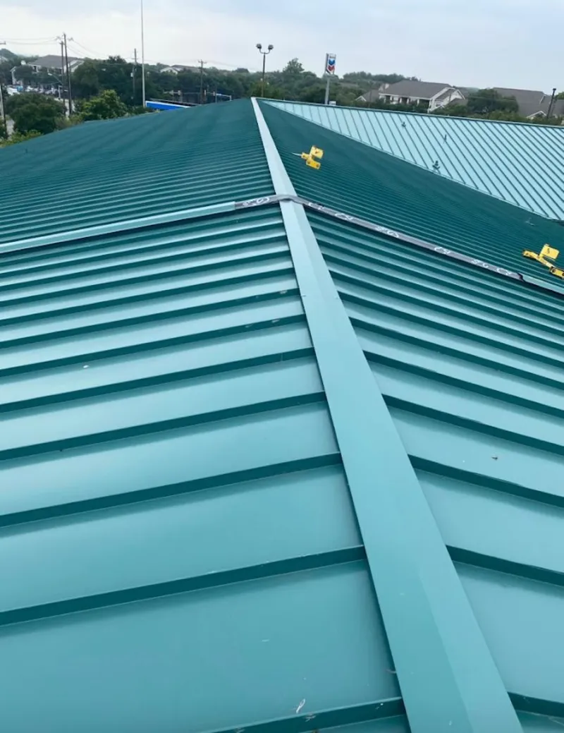 Green commercial metal roof ridge and valley for Metal Roof Repair in Waterville